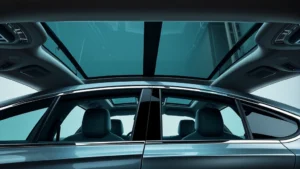 Sleek luxury sedan with panoramic sunroof, premium leather interior visible through windows, professional automotive photography studio lighting, metallic paint finish, modern chrome accents