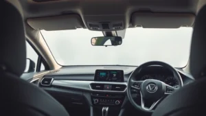 Modern sedan dashboard interior with clean lines, premium steering wheel, and digital instrument cluster, minimalist design, professional photography, daylight studio setting