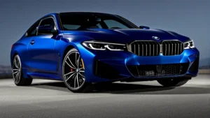 2024 BMW M440i xDrive sedan in metallic blue, three-quarter front view, dynamic lighting on premium alloy wheels, luxury automotive photography