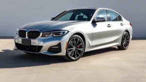 2024 BMW 3 Series M340i sedan photographed from three-quarter front angle, metallic silver paint, modern luxury design, professional automotive photography, daytime lighting, clean background, dynamic composition