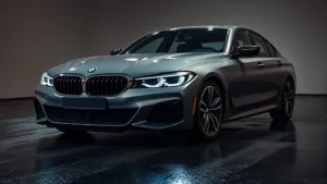 Sleek BMW M440i luxury sedan photographed from three-quarter front angle on wet asphalt, showing aggressive front grille, LED headlights, and premium alloy wheels in professional automotive studio lighting
