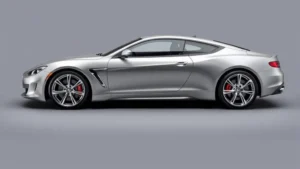 Sleek luxury sports sedan photographed from three-quarter angle, polished chrome wheels, professional automotive photography, studio lighting, pristine condition, no text visible